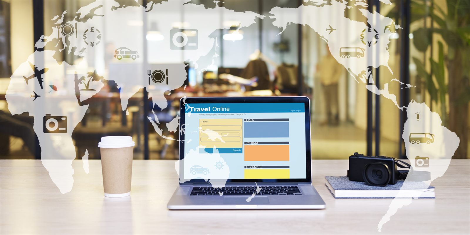 Laptop showing a travel booking website on a cafe table